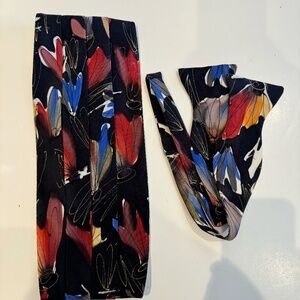 Silk Cummerbund with matching bow tie.